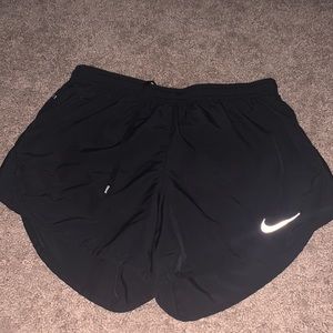 black nike athletic running shorts